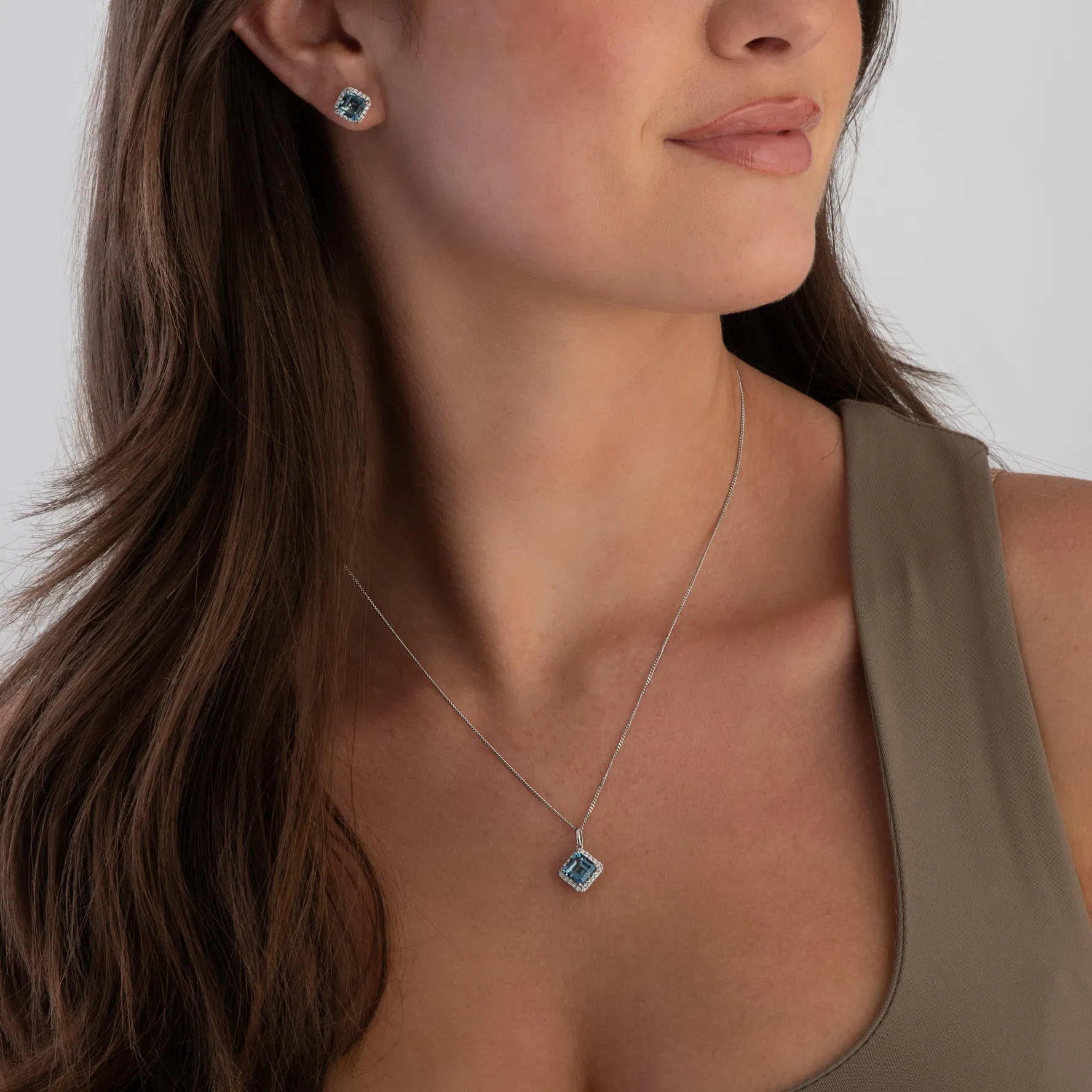 Beaverbrooks 9ct White Gold Diamond Blue Topaz Pendant